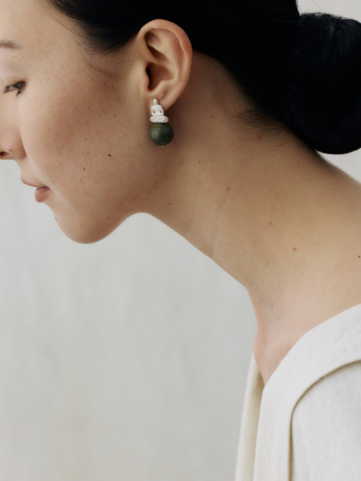 Seated Figure Sterling Silver & Green Sandalwood Stud Earrings