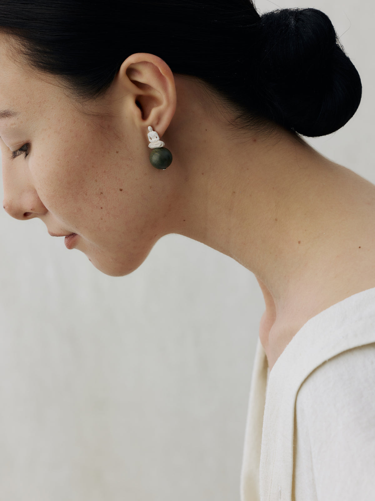 Seated Figure Sterling Silver & Green Sandalwood Stud Earrings