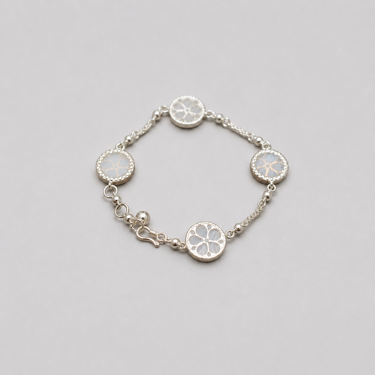 White Agate Inlaid Hollow Floral Bracelet