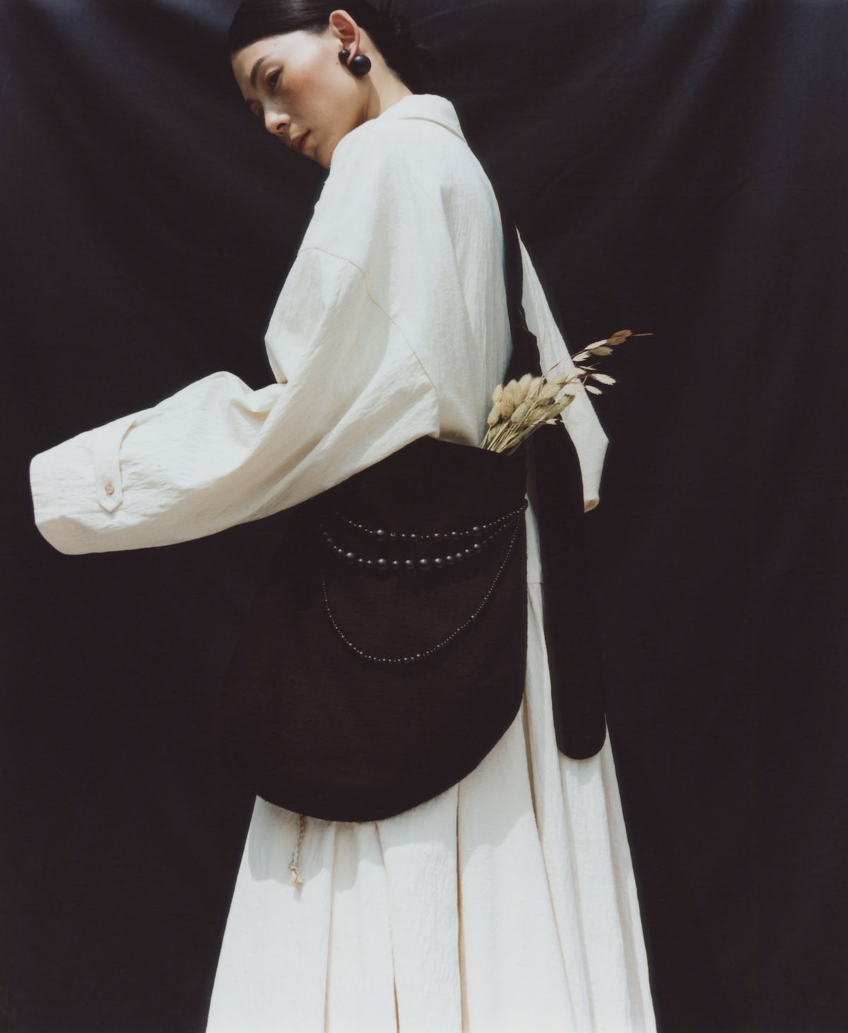 Pebble Handcrafted Ebony Beaded Crossbody Bag – Black Textured Canvas