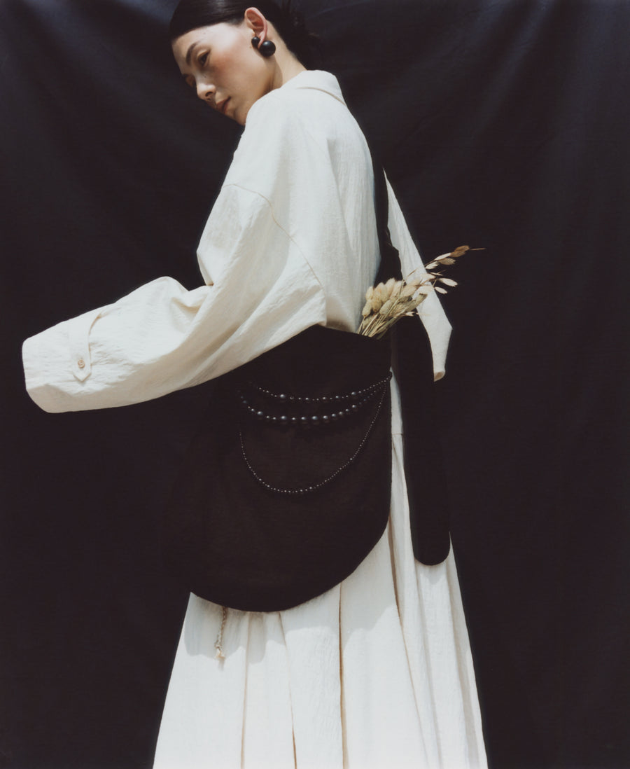 Pebble Handcrafted Ebony Beaded Crossbody Bag – Black Textured Canvas
