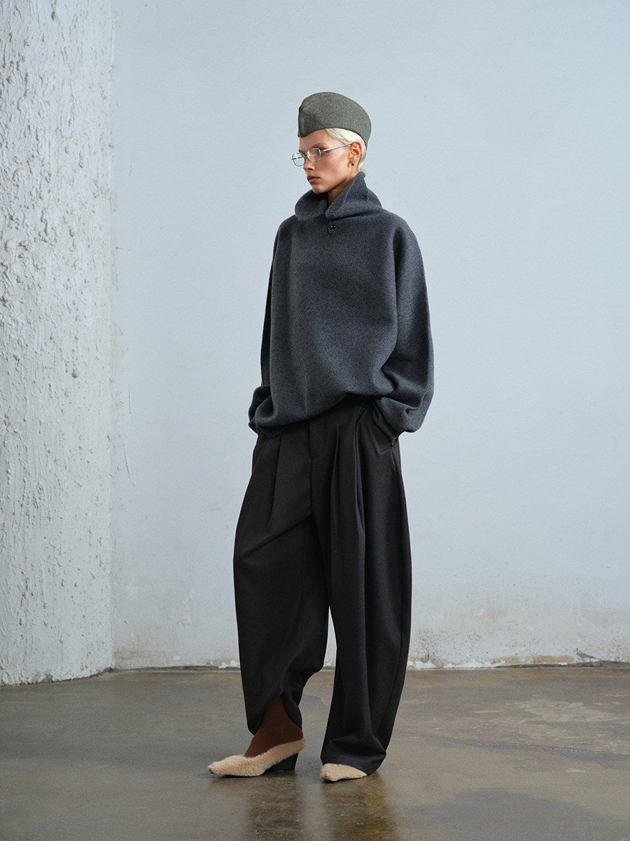 Pleated curved wide-leg trousers