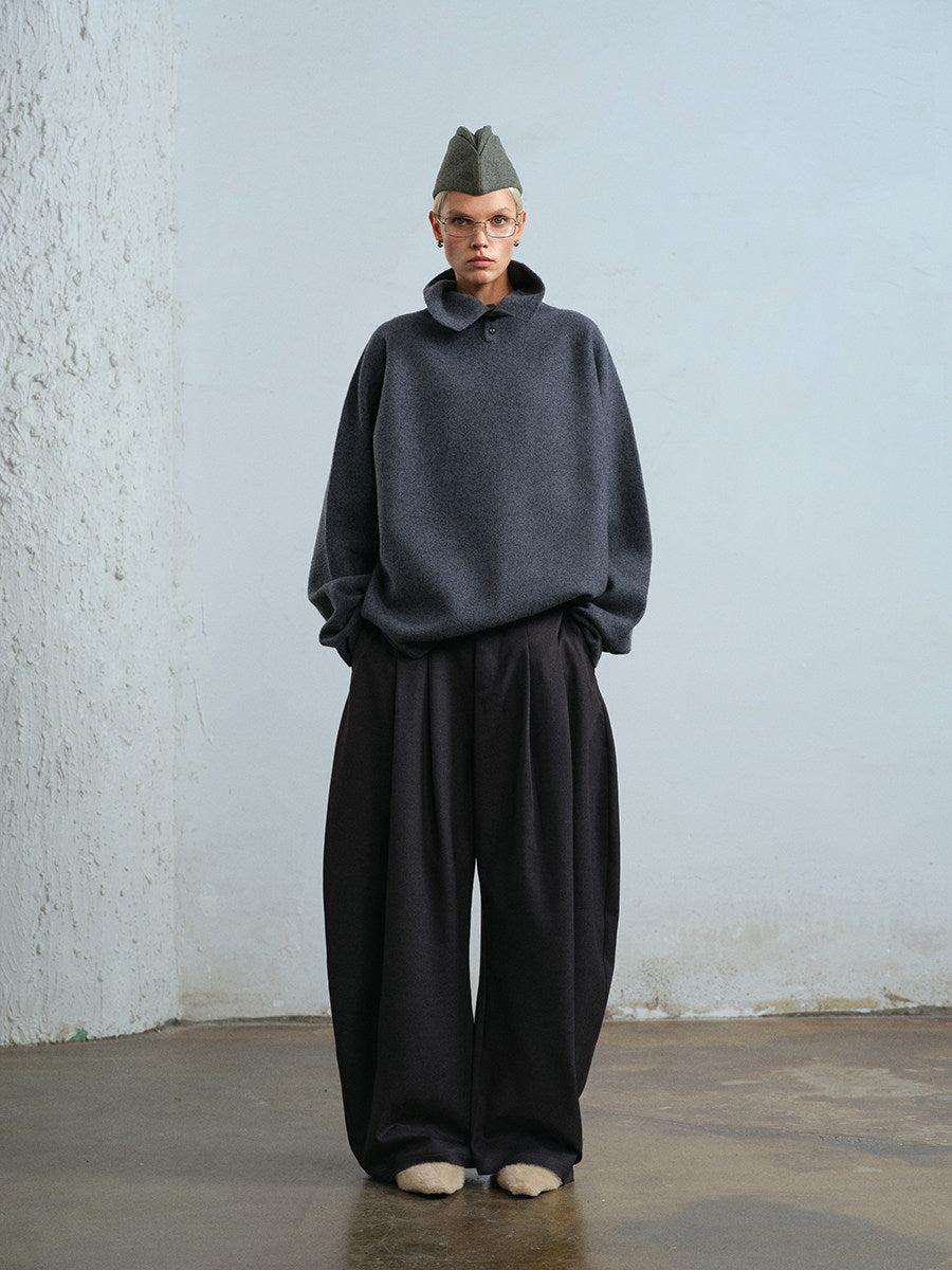 Pleated curved wide-leg trousers