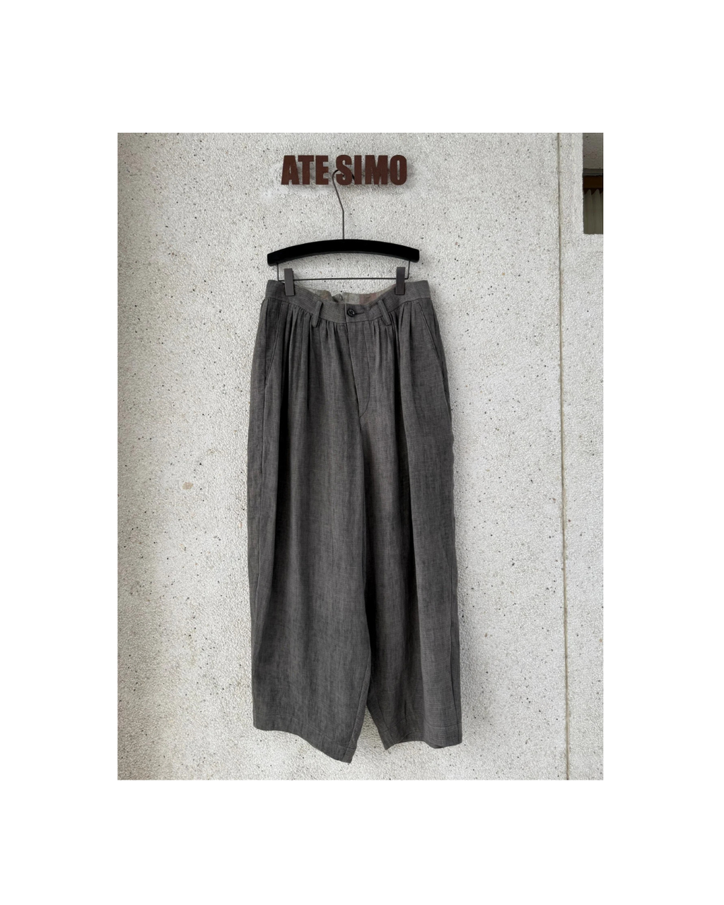 Multi-pleat relaxed-fit trousers